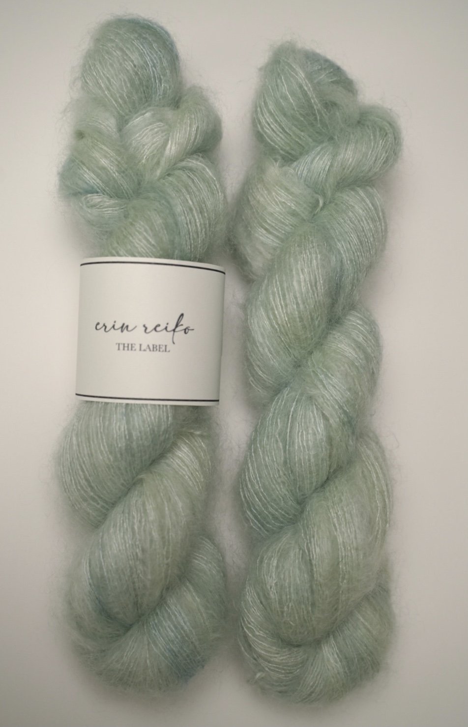 custom semisolid hand dyed yarn with pastel mint green and jade green on kid silk mohair yarn lace weight