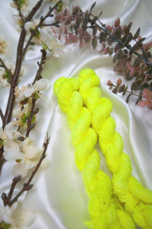 custom fluorescent neon yellow semisolid hand dyed yarn on nylon superwash sock yarn
