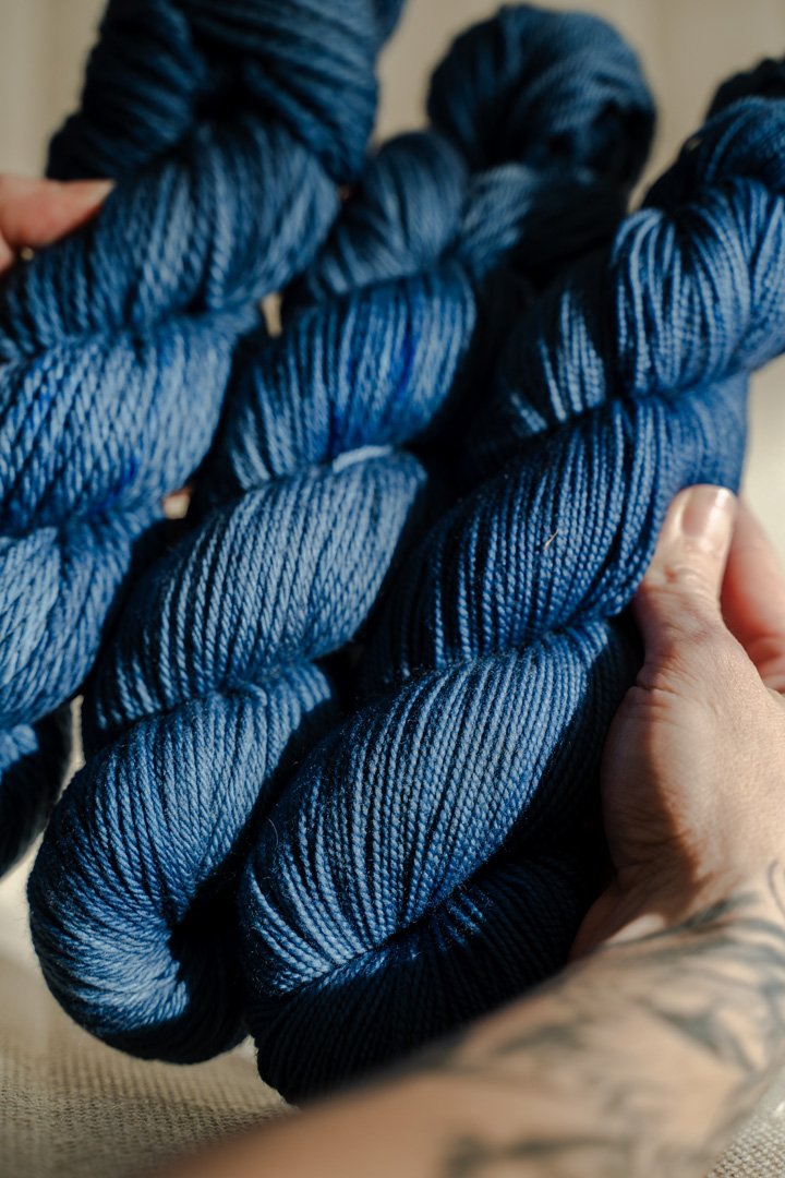custom ocean blue semisolid hand dyed yarn on nylon superwash sock yarn