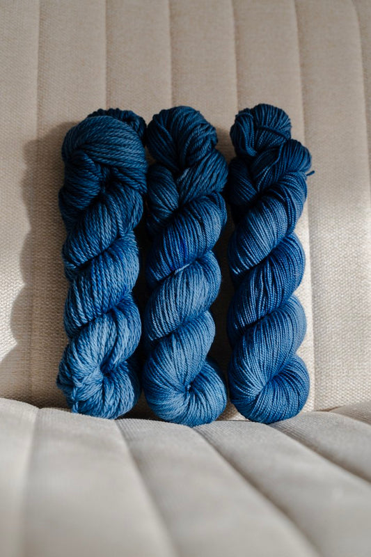 custom ocean blue semisolid hand dyed yarn on nylon superwash sock yarn
