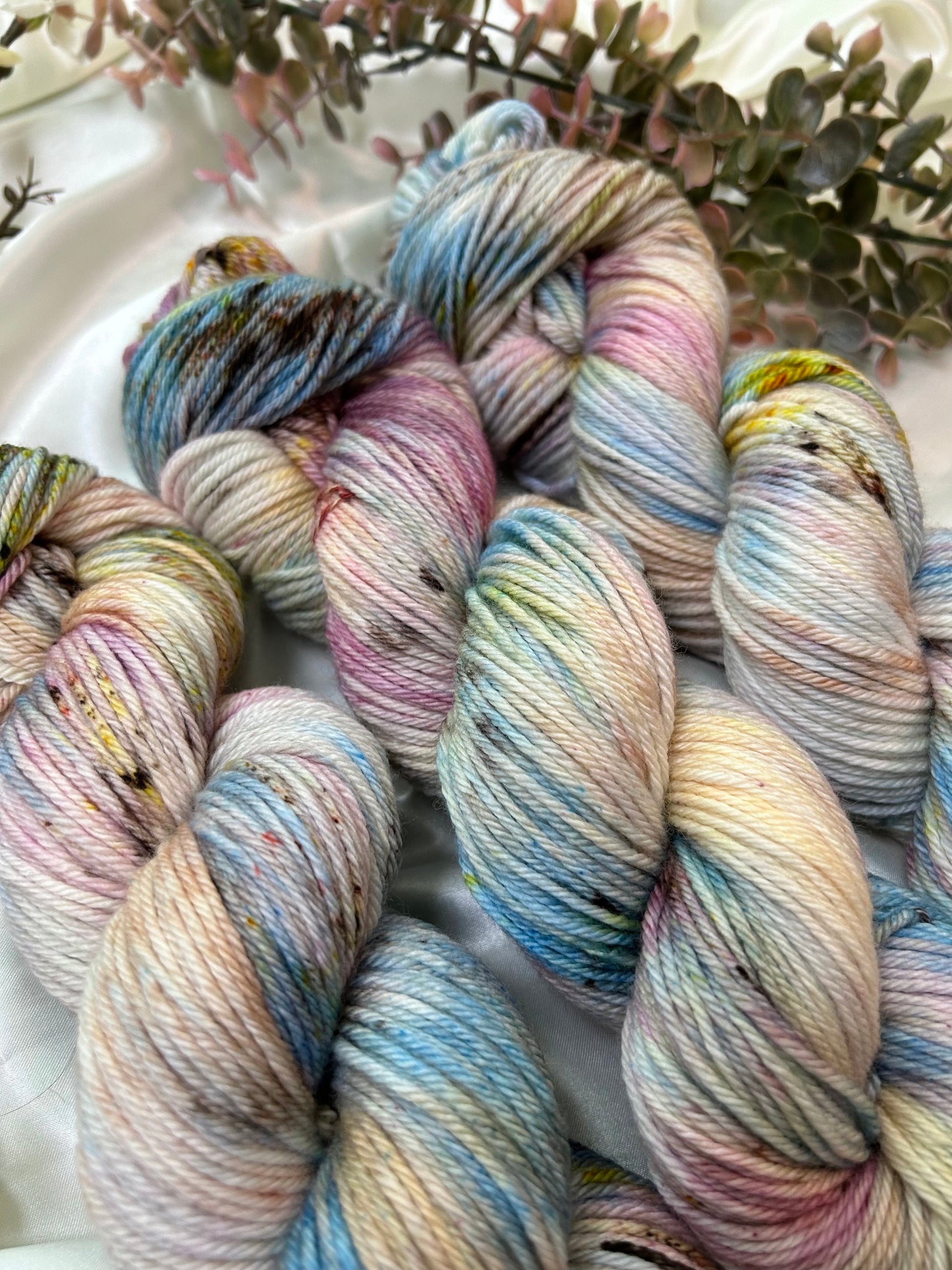 custom orchid pink, mauve, blue, cream variegated hand dyed with fawn brown speckles on superwash merino dk weight