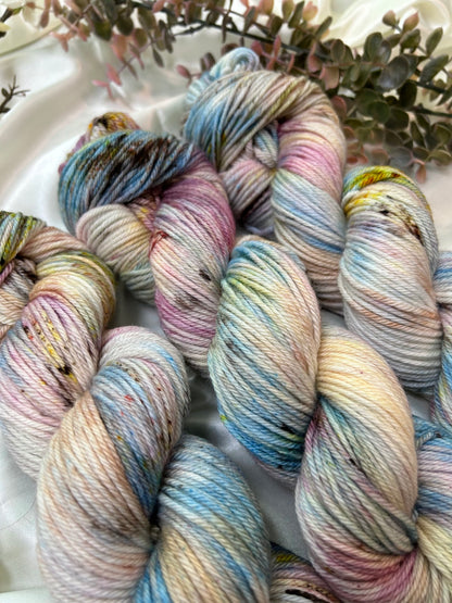 custom orchid pink, mauve, blue, cream variegated hand dyed with fawn brown speckles on superwash merino dk weight