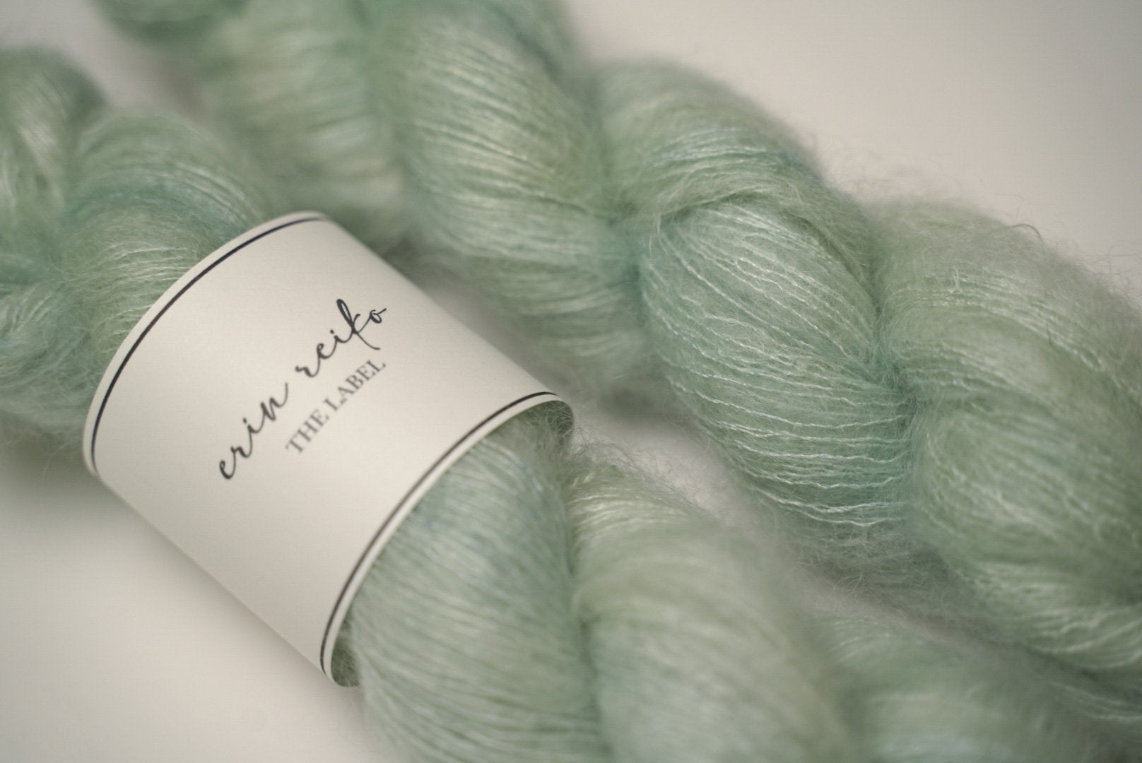 custom semisolid hand dyed yarn with pastel mint green and jade green on kid silk mohair yarn lace weight