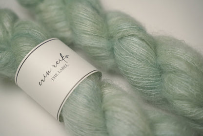 custom semisolid hand dyed yarn with pastel mint green and jade green on kid silk mohair yarn lace weight