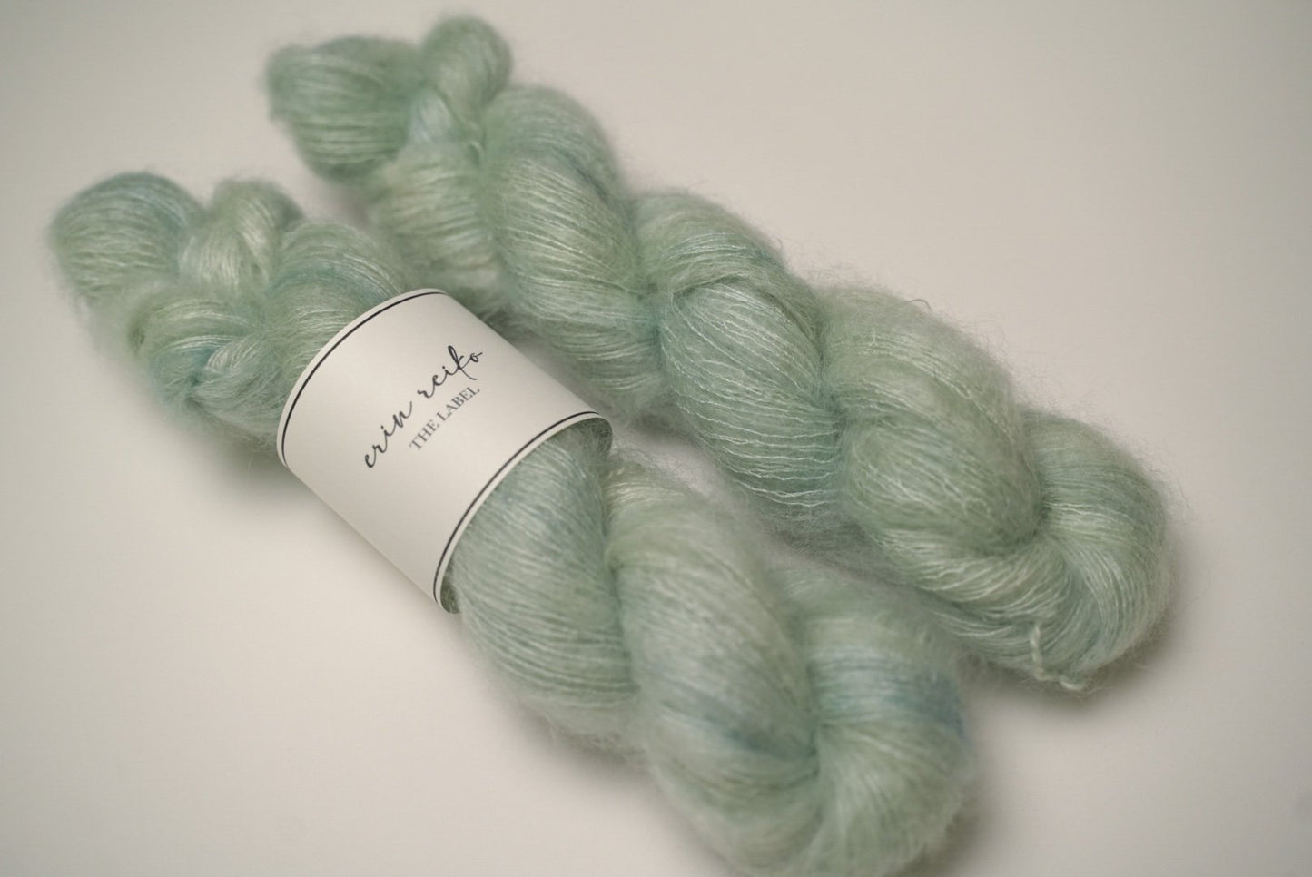 custom semisolid hand dyed yarn with pastel mint green and jade green on kid silk mohair yarn lace weight
