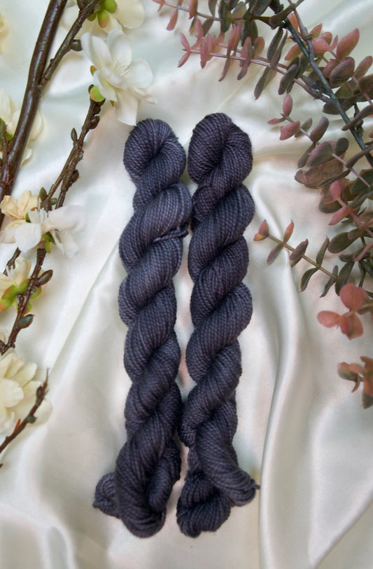 custom semisolid hand dyed yarn with deep grey on nylon superwash sock yarn