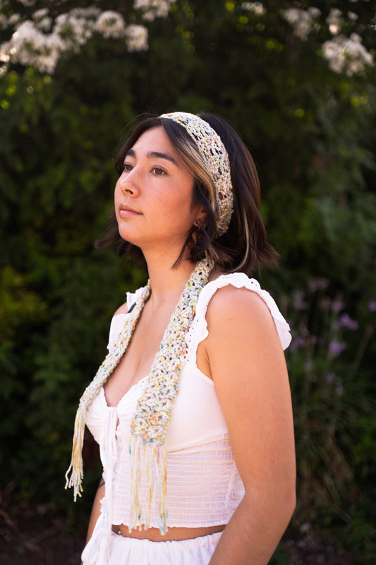 erin wearing a unique lace crochet accessory as a scarf headband, made with variegated hand dyed yarn