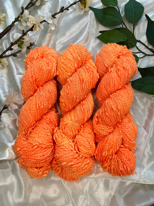 custom neon orange hand dyed yarn semi solid dyed on superwash slub fiber