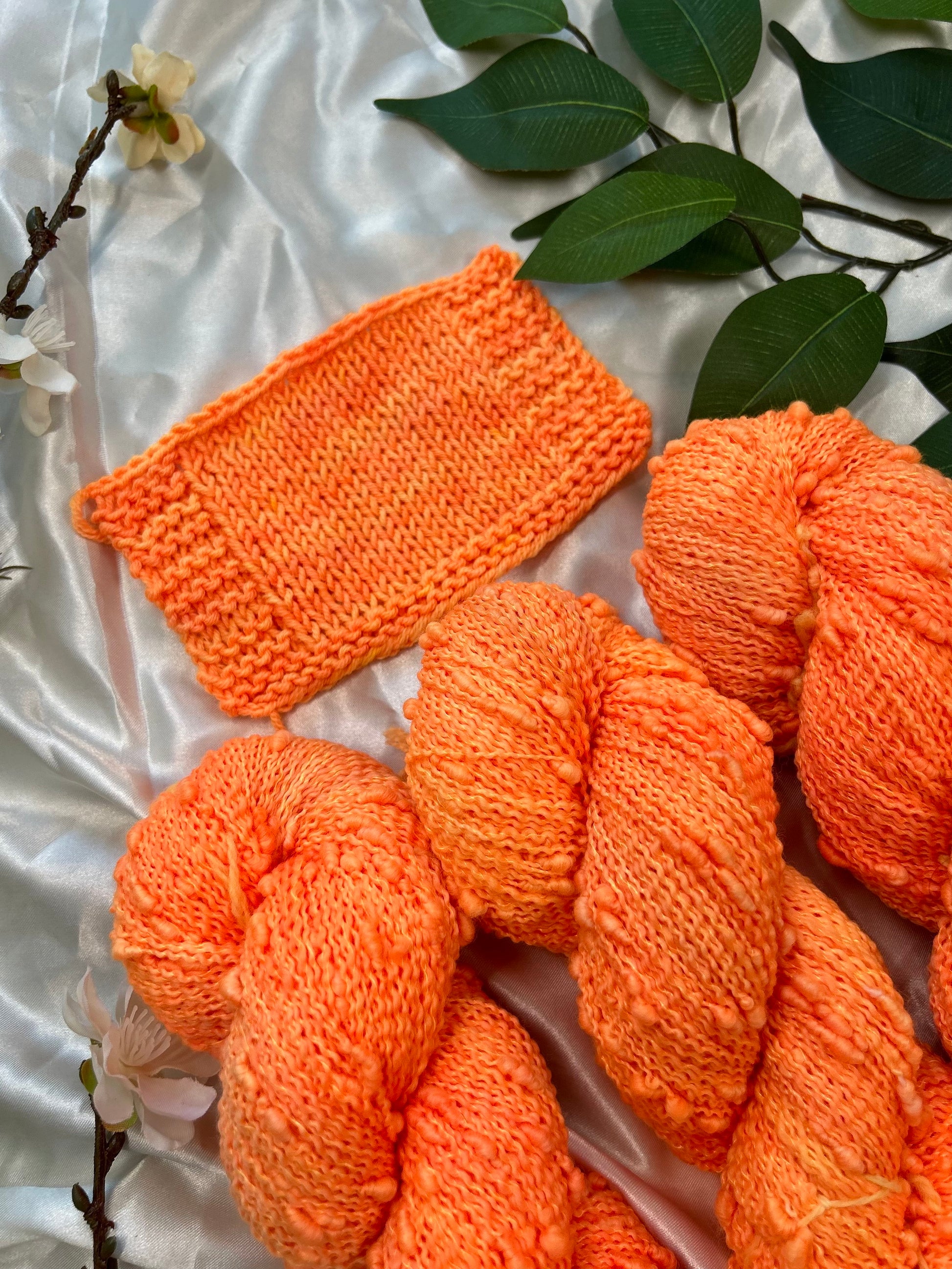 custom neon orange hand dyed yarn semi solid dyed on superwash slub fiber and swatch