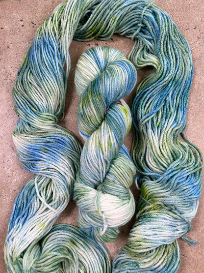 custom ocean blue, lime green and seafoam green variegated hand dyed yarn  on superwash merino dk weight