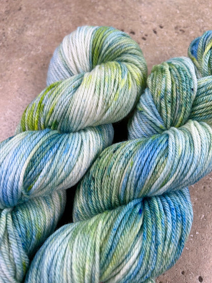 custom ocean blue, lime green and seafoam green variegated hand dyed yarn  on superwash merino dk weight