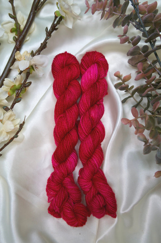 custom fuschia, pink and magenta semisolid hand dyed yarn on nylon superwash sock yarn