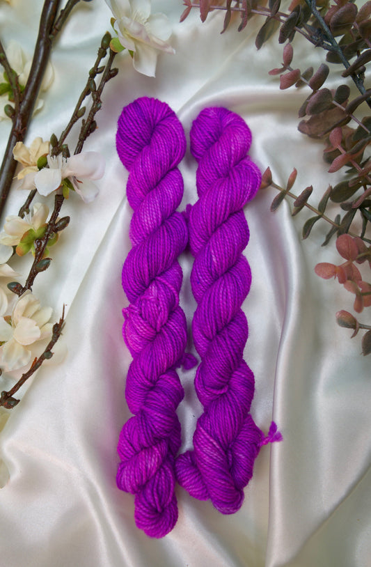 custom fluorescent purple blue semisolid solid hand dyed yarn on nylon superwash sock