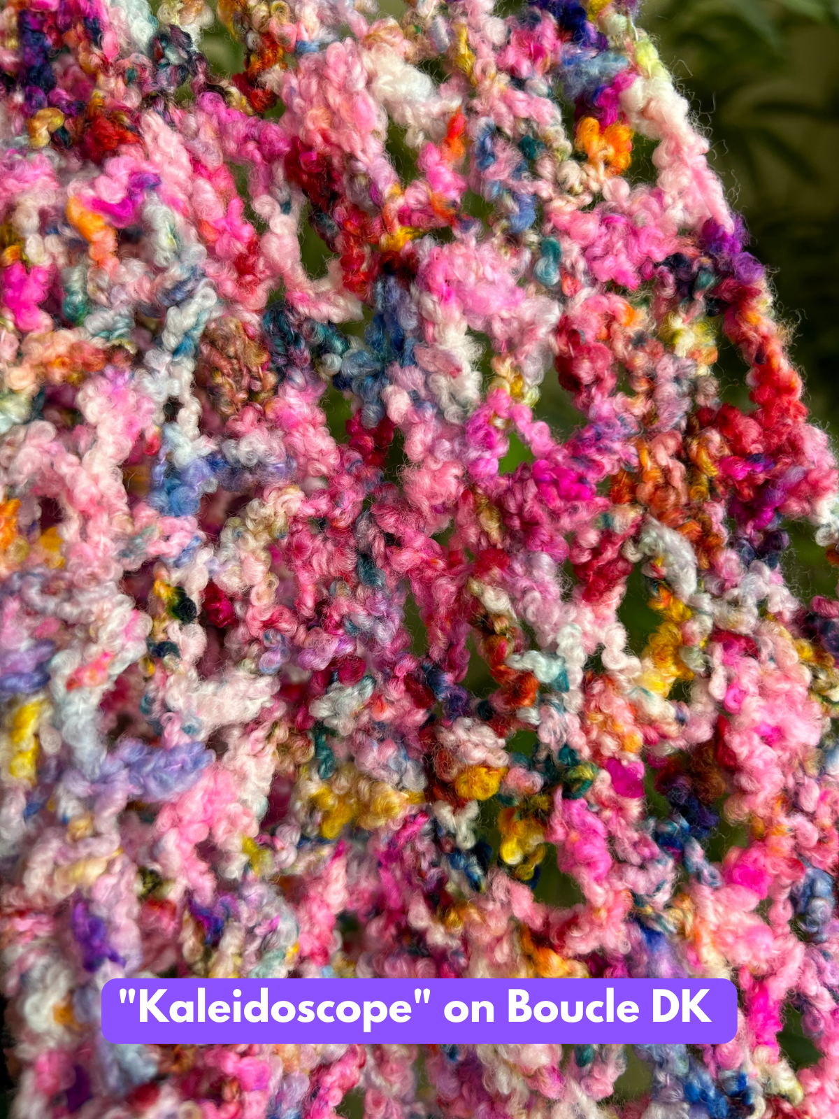 kaleidoscope hand dyed yarn crochet swatch on superwash merino boucle yarn