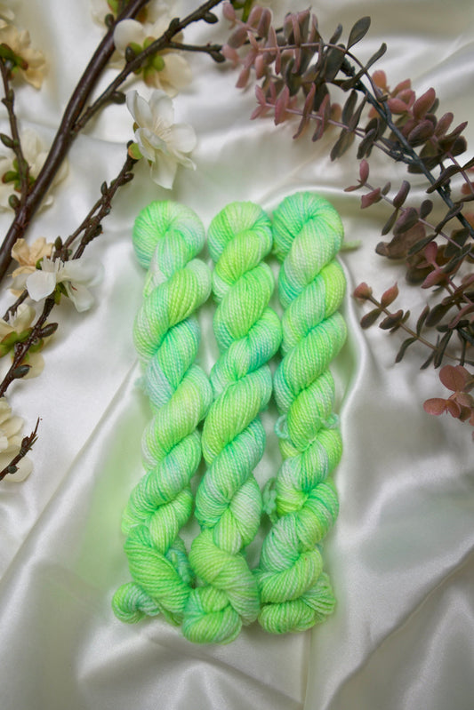 custom fluorescent green, blue and yellow semisolid hand dyed yarn on nylon superwash sock