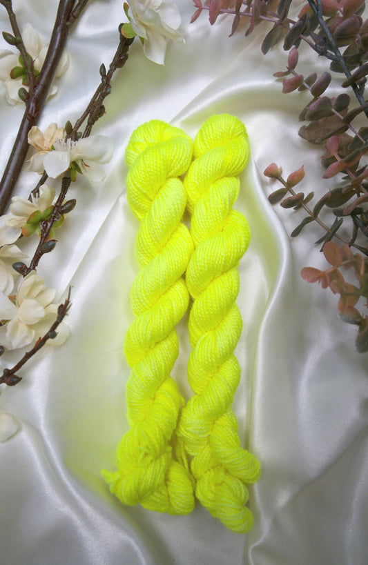 custom fluorescent neon yellow semisolid hand dyed yarn on nylon superwash sock yarn