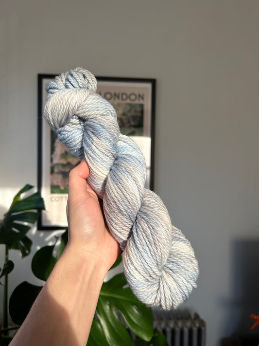 custom light blue, bright blue, soft tan, grey variegated hand dyed yarn on superwash merinoo chunky weight