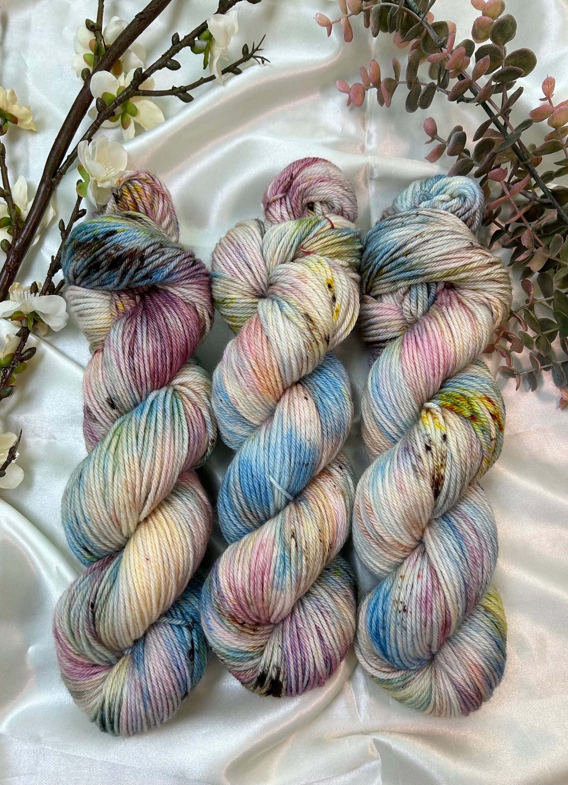 custom orchid pink, mauve, blue, cream variegated hand dyed with fawn brown speckles on superwash merino dk weight