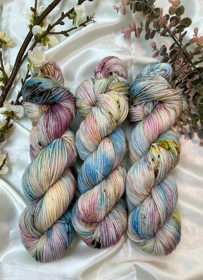 custom orchid pink, mauve, blue, cream variegated hand dyed with fawn brown speckles on superwash merino dk weight